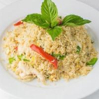 Basil Fried Rice · Fried rice with eggs, bell peppers, onions, basil and garlic chili sauce.