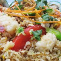 Ocean Avocado Fried Rice · Fried rice with shrimp, scallops, calamari, mussels, crab meat and avocado.