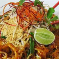 Pad Thai Noodle · Stir fried thin rice noodles, 2 tofu, eggs, scallions, bean sprouts, and crushed peanuts in ...