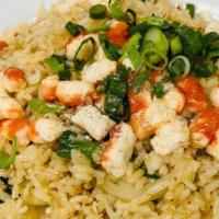 Vegan Crab Fried Rice · Vegan Crab stir-fried fried rice with yellow onion, green onion, tomatoes. (No eggs)