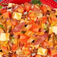 Hollywood Salad · Grilled chicken breast and turkey bacon with reduced-fat cheddar cheese, tomatoes, onions an...