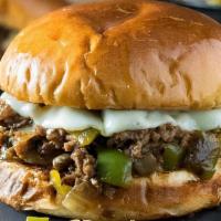 Philly Burger · Peppers, mushrooms, onions, and Swiss and American cheese, mushroom. Includes: hand cut frie...