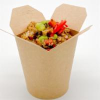 Japanese Edamame Fried Rice · Japanese style, lightly charred rice, edamame, carrots, seaweed; topped with pickled ginger