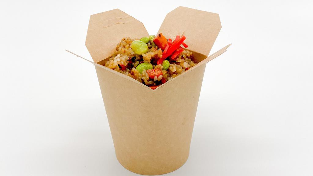 Japanese Edamame Fried Rice · Japanese style, lightly charred rice, edamame, carrots, seaweed; topped with pickled ginger