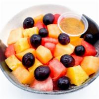 Honey Yuzu Fruit Bowl · watermelon, pineapple, cantaloupe, black grapes; side of yuzu wild honey sauce