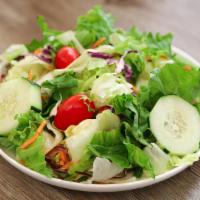 Garden Salad · Lettuce, tomatoes, carrots, and red cabbage served with ranch or Italian dressing.