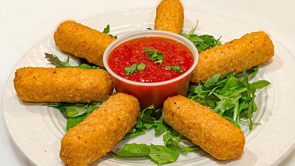 Mozzarella Sticks · Mozzarella cheese sticks rolled in bread crumbs, lightly fried and served with marinara sauce