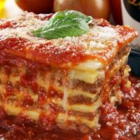Meat Lasagna · Layers of ribbon pasta, ground beef, ricotta, and mozzarella cheese, and parmesan cheese.