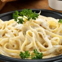 Fettuccine Alfredo With Chicken (Large) · Fettuccine pasta in our own creamy alfredo sauce and grilled chicken.