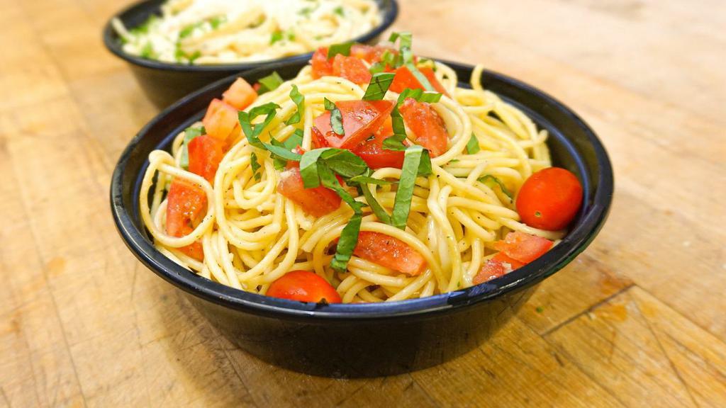 Spaghetti Pomodoro (Small) · Spaghetti tossed with diced tomatoes, fresh basil, garlic, extra virgin olive oil, and a touch of marinara sauce.