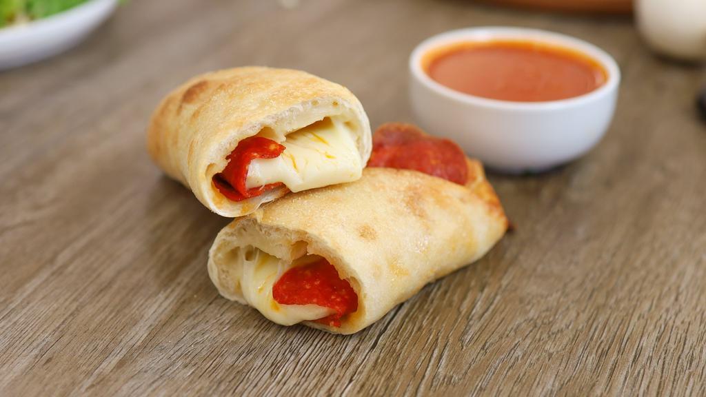 Pepperoni Roll · Baked pizza roll stuffed with pepperoni and mozzarella cheese.