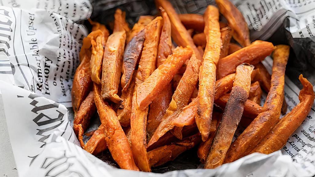 Side Of Sweet Potato Fries · Served with cinnamon marshmallow sauce.