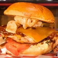 Bbq Chicken · Made in house BBQ sauce drenched chicken with chicharrones, caramelized onions, mayo, and ch...