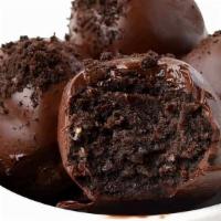 Chocolate Rum Balls · Chocolate Rum Cake Balls filled with melted chocolate  inside and outside.