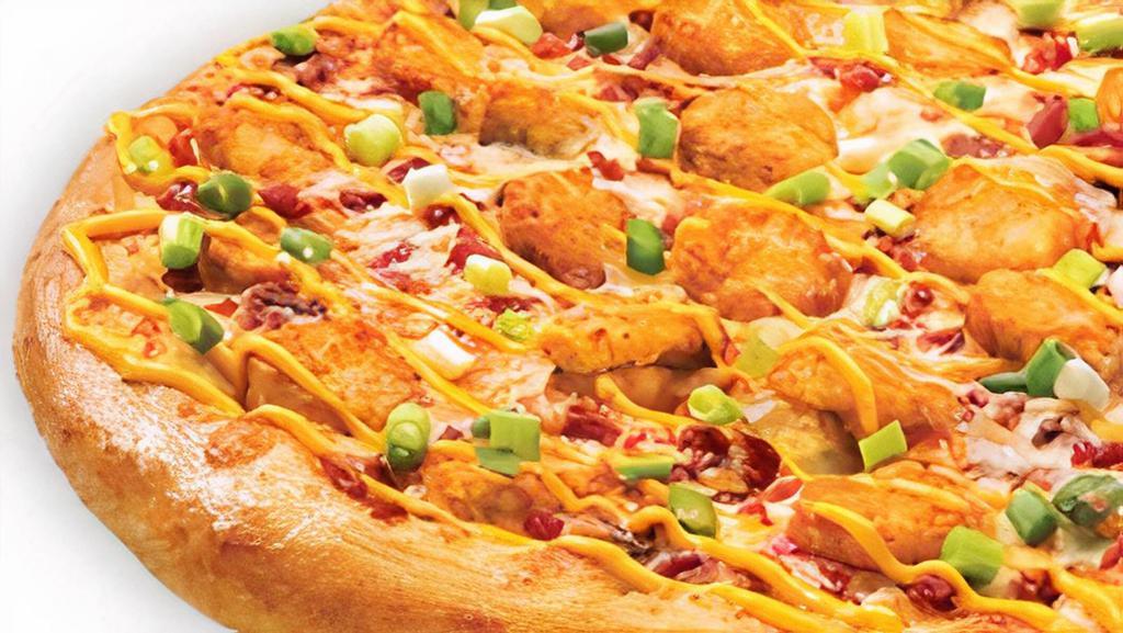 Loaded Tot-Zza Pizza · Ranch sauce topped with 100% real Wisconsin mozzarella cheese, tater tots, applewood smoked bacon, green onions and drizzled with nacho cheese.