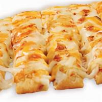 Triple 3-Cheese Garlicstix Topperstix · Our delicious Original Topperstix topped with roasted garlic, asiago and cheddar cheese. Mad...