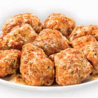Parmesan Garlic Boneless Wings · Our tender boneless wings; breaded, oven-roasted, and then tossed in parmesan garlic sauce. ...