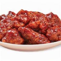 Smoky Bbq Boneless Wings · Our tender boneless wings; breaded, oven-roasted, and then tossed in smoky BBQ sauce. An ama...