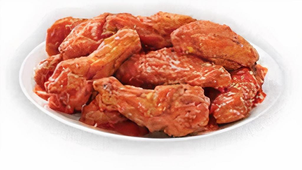 Hot Buffalo Bone-In Wings · Our traditional bone-in wings oven roasted, and then tossed in hot buffalo sauce. For those who are not afraid of the burn.