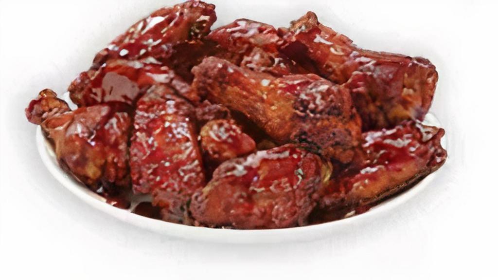 Smoky Bbq Bone-In Wings · Our traditional bone-in wings oven roasted, and then tossed in smoky BBQ sauce. An amazing combination of sweet and smoky.