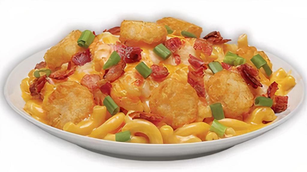 Loaded Tater Mac Mac N Cheese · Our 3-Cheese Wisconsin Mac topped with tater tots, applewood smoked bacon, and green onions.