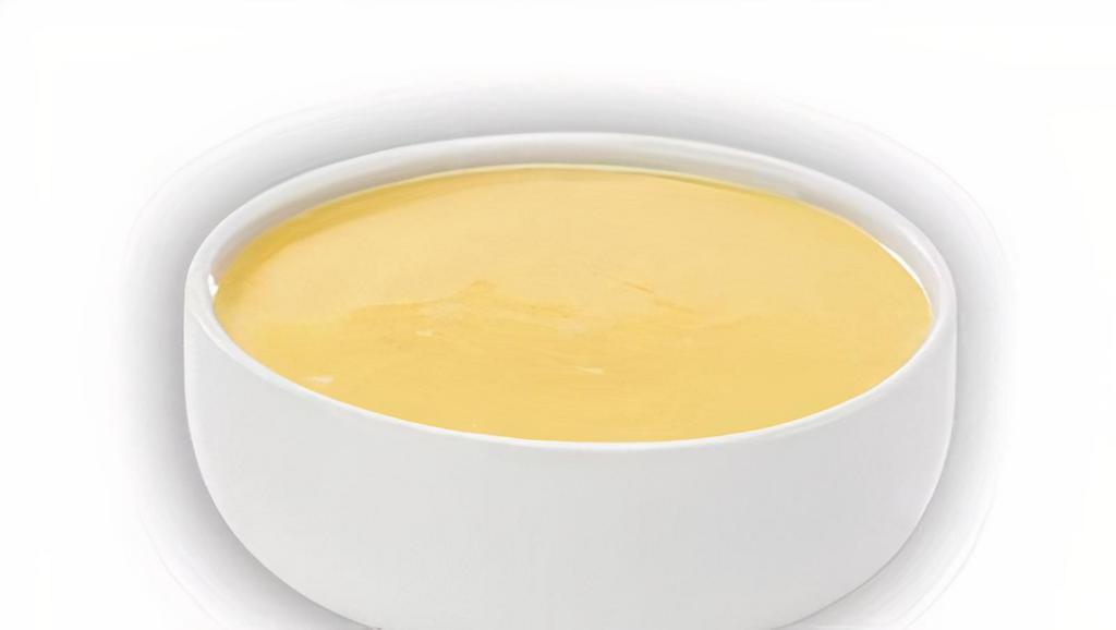 Garlic Sauce · A garlic and salty butter sauce that is great for dipping crust or Topperstix.