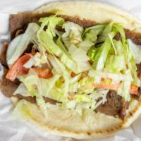 Gyro · Blend of marinated grilled lamb and beef with tomatoes, onions and tzatziki sauce.