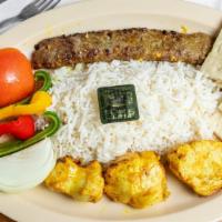 Kabob & Chicken · Halal. Comes with rice, pita bread, and skewers of roasted vegetables with tzatziki sauce.