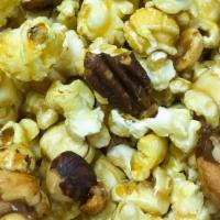 Caramel Popcorn Bag With Nuts · Caramel popcorn with pecans, almonds, cashews, and peanuts.