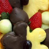Daisies & More Fruit Bouquet · Melon and orange wedges, chocolate-dipped strawberries and pineapple daisies.