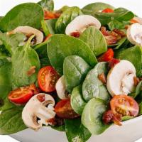 Spinach Salad · Spinach leaves, mushrooms, red onions, tomatoes, eggs and bacon.