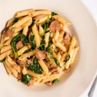 Penne Toscano · Penne pasta tossed with olive oil, fresh garlic, spinach, Italian sausage and Parmigiana che...