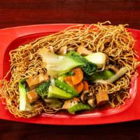 Vegetarian Crispy Noodles · Wok-tossed with tofu, onion, broccoli, bok choy, snow peas, carrots, mushroom in our vegetar...