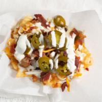 Fully Loaded Fries · Cheese, ranch, bacon bits and jalapeños.