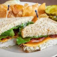 California Turkey Club Sandwich · Turkey, bacon, avocado, lettuce, tomato and cheddar cheese with a honey mustard spread on Mi...