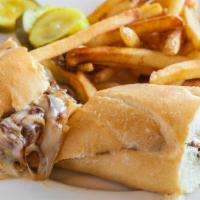 Grilled Philly Steak Sandwich · Grilled tenderloin steak, caramelized onions, mozzarella cheese, green bell peppers and mush...