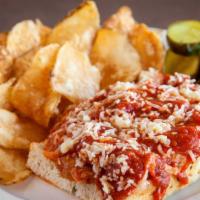 Chicken Parmigiana Sandwich · Breaded chicken breast and melted mozzarella cheese, covered with marinara sauce and topped ...