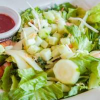 Fresh Garden Salad · Romaine lettuce, carrots, cabbage mix tomatoes and cucumber.