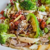 Veggie Pasta · Grilled vegetables served on penne pasta tossed with sun-dried tomato medley or basil pesto,...