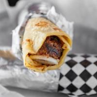 Kabab Rolls (2) · Ground beef kababs rolled in a paratha with onions, cilantro, chaat masala and a tangy chutn...