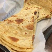 Roti · Our signature home-style flat bread made with a mix of wheat and flour and shallow fried wit...