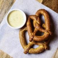 Pretzels · Two baked pretzels served with our savory Crawford Bock beer cheese