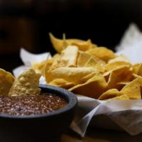 Chips N Salsa · Fire roasted tomato salsa with tortilla chips
