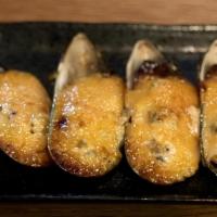 Baked Mussels · Chopped mussels baked in a spicy mayo.