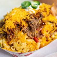 #Sananto Style Dignowity Pie · Flaming Hot Cheetos topped with Sharp Cheddar Mac, Cream Cheese Corn Bake, Pulled Pork, Sour...