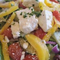 Greek Salad · romaine, tomatoes, red onions, kalamata olives, cucumber, yellow pepper, topped with feta ch...