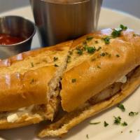 Grilled Chicken Sandwich · chicken breast on French bread, topped with grilled mushrooms, onions, fresh mozzarella, ser...