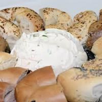 Bagel Bag With 2 Tubs Cream Cheese · A baker's dozen assorted bagels with choice of two spreads.

Plain,whole wheat,sesame,cinn r...