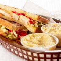 Grilled Chicken Pesto Panini · Grilled chicken, melted mozzarella, roasted red peppers and pesto.