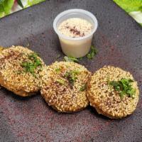 Falafel 4 Pieces · Vegetarian. Fried patties of ground chickpeas spiced to perfection, topped with sesame seeds...